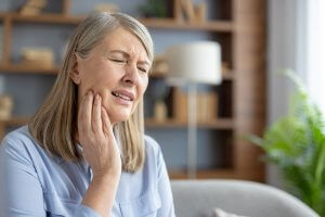 Elderly Woman With A Toothache Dental Emergency in Gresham, Oregon